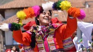 local peruvian woman dancing at the mainsquare of Cusco